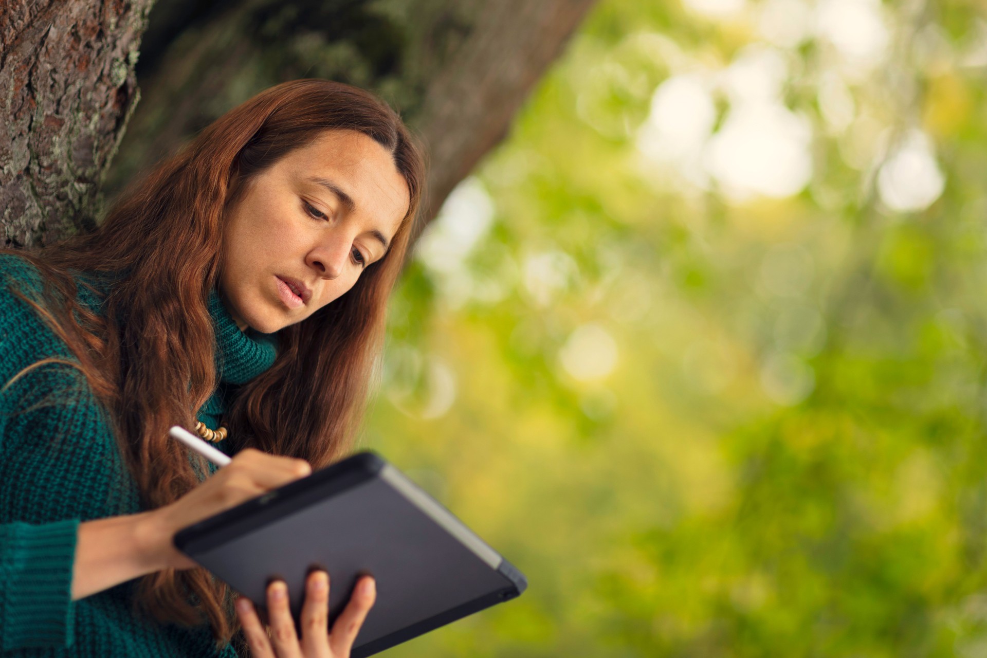 Digital artist working in nature